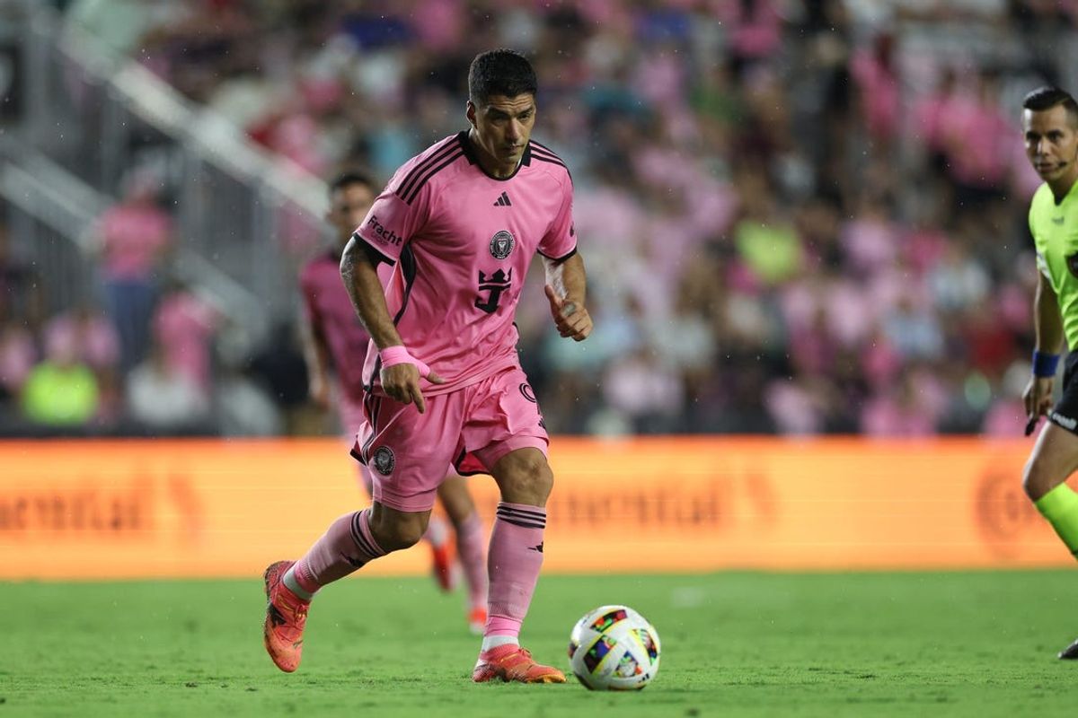 May 29, 2024; Fort Lauderdale, Florida, USA; Inter Miami CF forward Luis Suarez (9) dribbles against Atlanta United during the second half at Chase Stadium. Mandatory Credit: Nathan Ray Seebeck-USA TODAY Sports