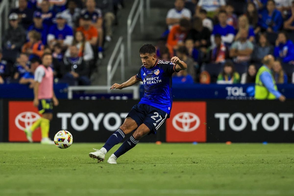 May 29, 2024; Cincinnati, Ohio, USA; FC Cincinnati midfielder Yamil Asad (27) kicks the ball against Nashville SC in the second half at TQL Stadium. Mandatory Credit: Katie Stratman-USA TODAY Sports