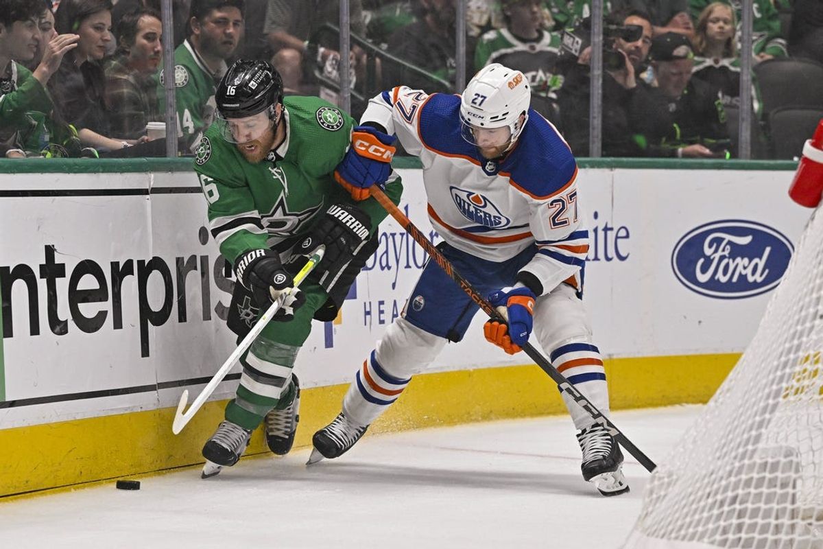 May 25, 2024; Dallas, Texas, USA; Dallas Stars center Joe Pavelski (16) and Edmonton Oilers defenseman Brett Kulak (27) in action during the game between the Dallas Stars and the Edmonton Oilers in game two of the Western Conference Final of the 2024 Stanley Cup Playoffs at American Airlines Center. Mandatory Credit: Jerome Miron-USA TODAY Sports