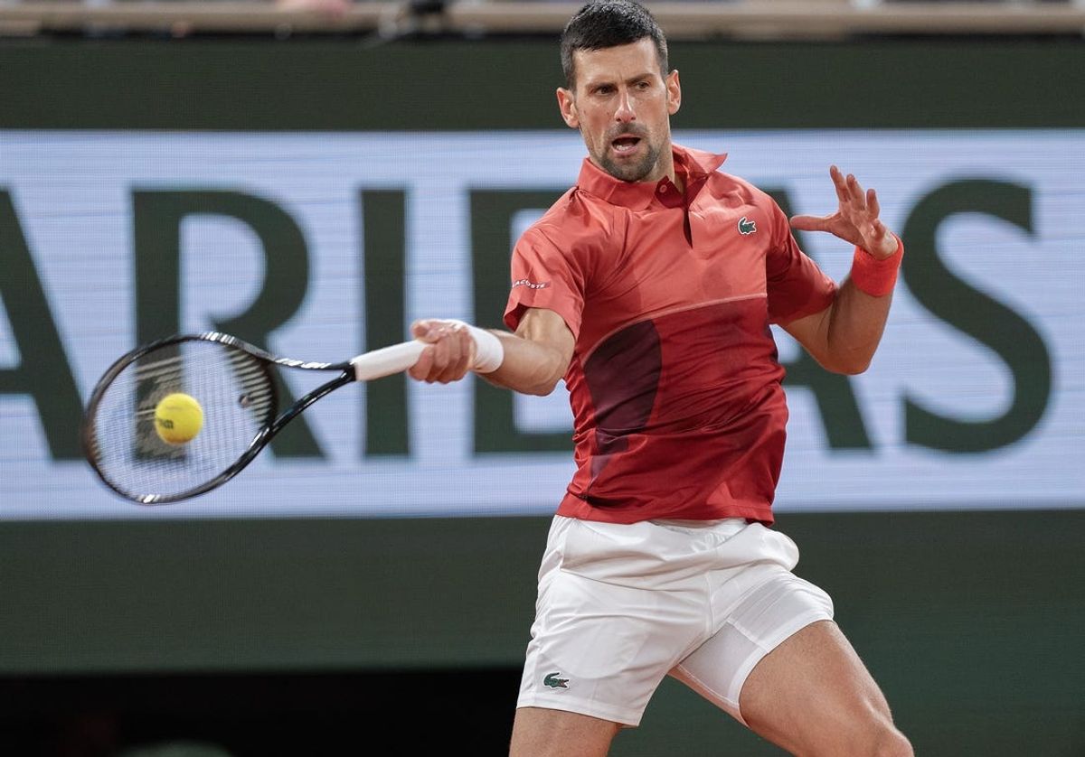 May 30, 2024; Paris, France; Novak Djokovic of Serbia returns a shot during his match against Roberto Carballes Baena of Spain on day five of Roland Garros at Stade Roland Garros. Mandatory Credit: Susan Mullane-USA TODAY Sports