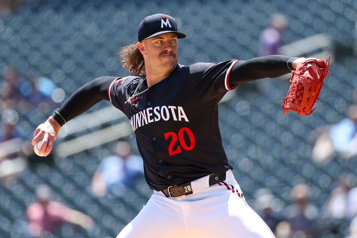 May 30, 2024; Minneapolis, Minnesota, USA; Minnesota Twins starting pitcher Chris Paddack (20) delivers a pitch against the Kansas City Royals during the first inning at Target Field. Mandatory Credit: Matt Krohn-USA TODAY Sports