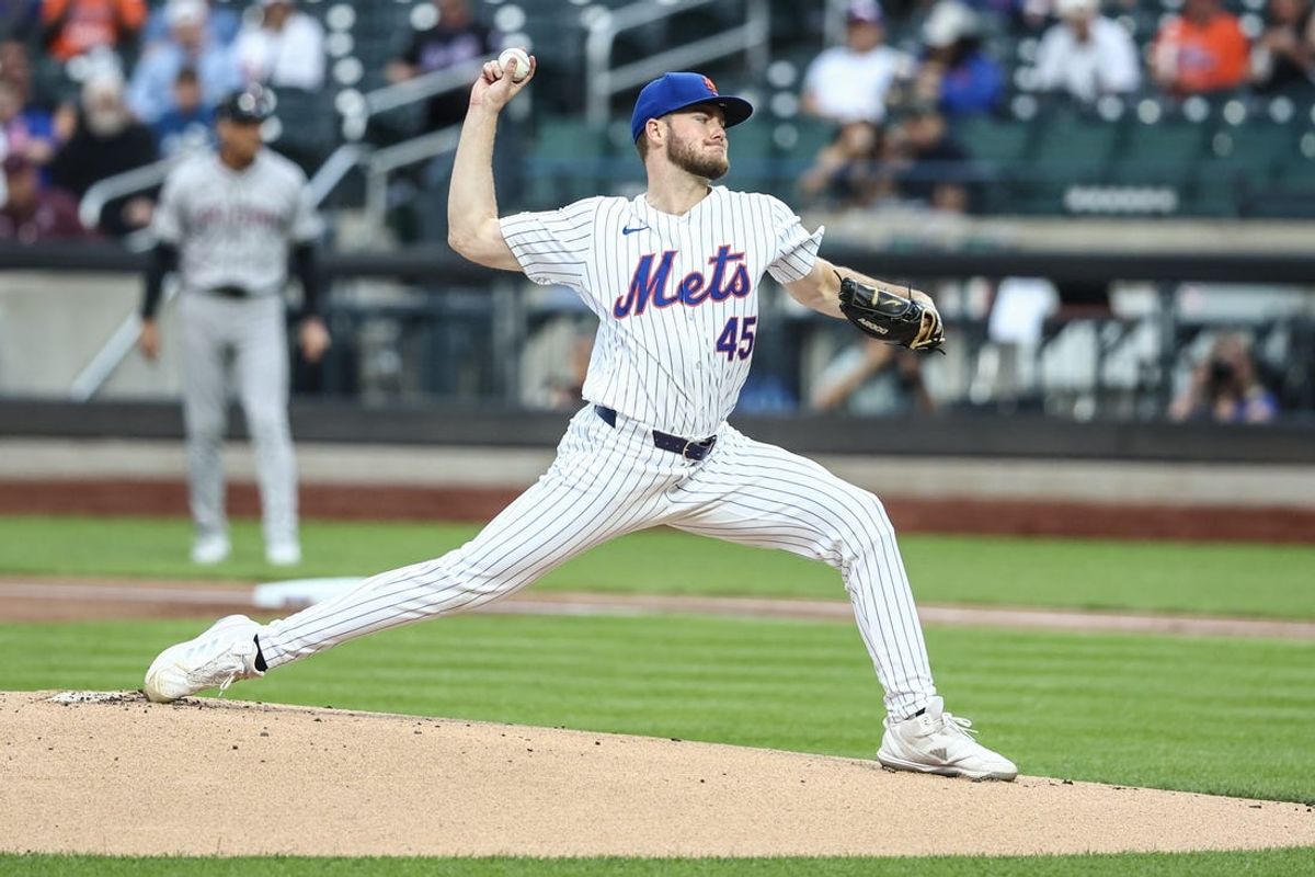 May 30, 2024; New York City, New York, USA; New York Mets starting pitcher Christian Scott (45) pitches in the first inning against the Arizona Diamondbacks at Citi Field. Mandatory Credit: Wendell Cruz-USA TODAY Sports