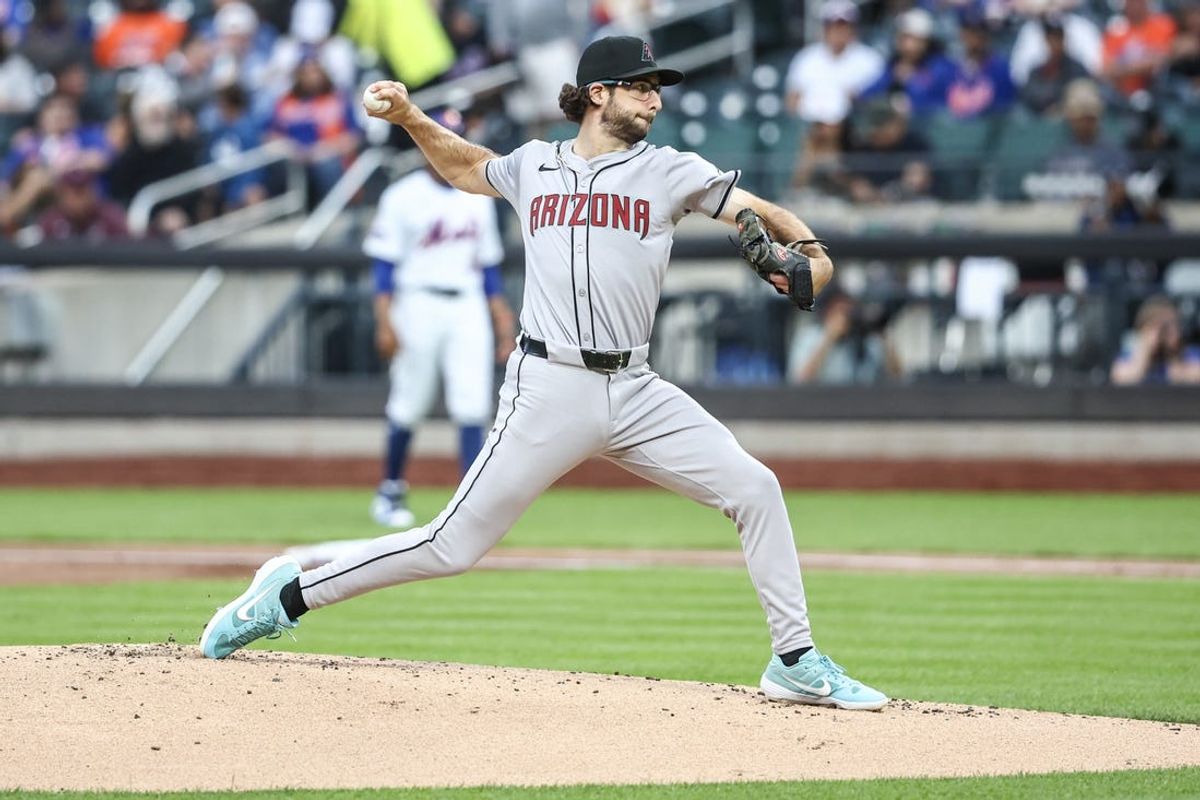May 30, 2024; New York City, New York, USA; Arizona Diamondbacks starting pitcher Zac Gallen (23) pitches in the first inning against the New York Mets at Citi Field. Mandatory Credit: Wendell Cruz-USA TODAY Sports