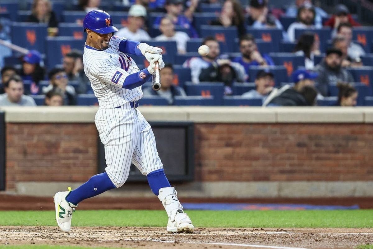 May 30, 2024; New York City, New York, USA; New York Mets shortstop Francisco Lindor (12) hits a solo home run in the third inning against the Arizona Diamondbacks at Citi Field. Mandatory Credit: Wendell Cruz-USA TODAY Sports