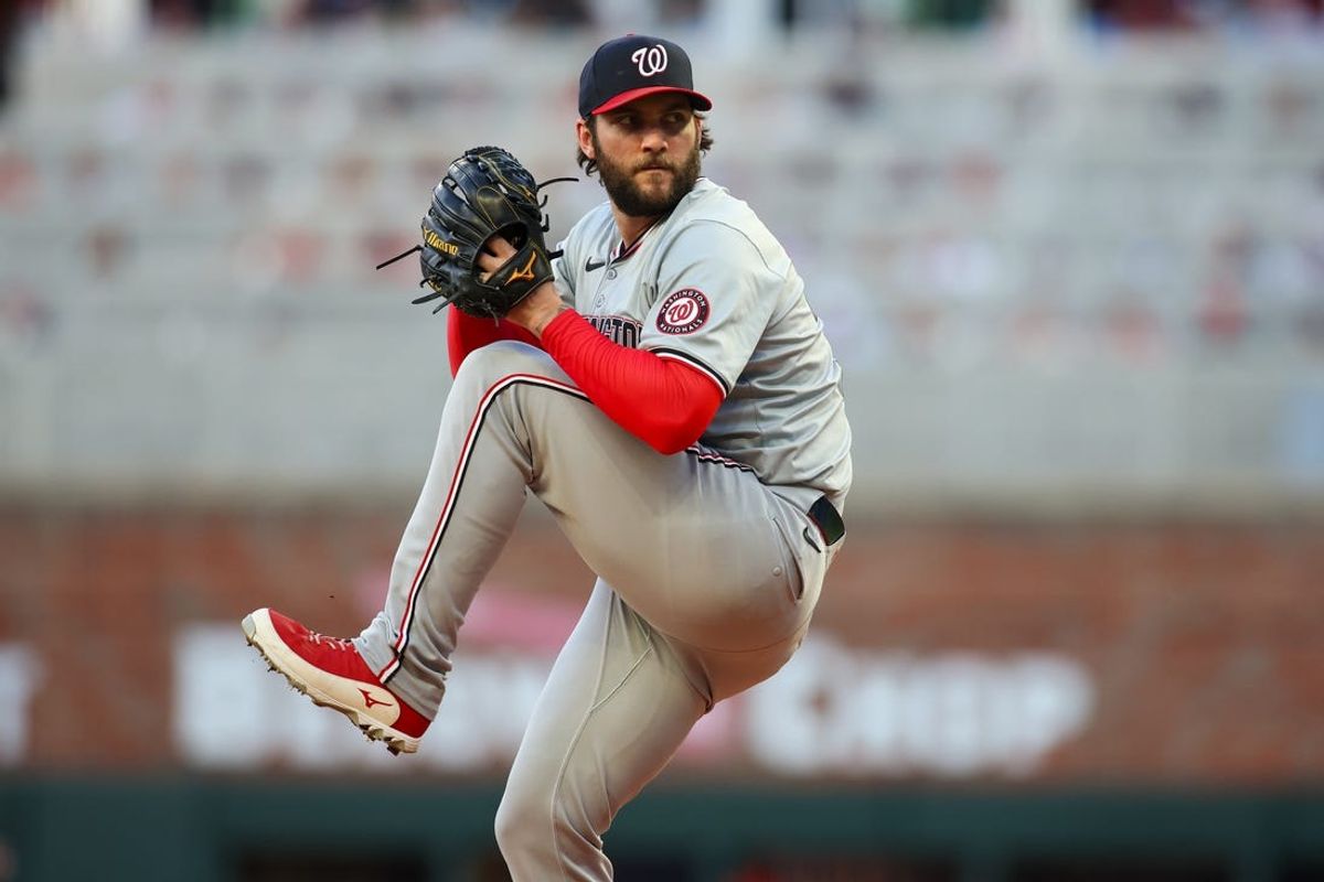 May 30, 2024; Atlanta, Georgia, USA; Washington Nationals starting pitcher Trevor Williams (32) throws against the Atlanta Braves in the third inning at Truist Park. Mandatory Credit: Brett Davis-USA TODAY Sports