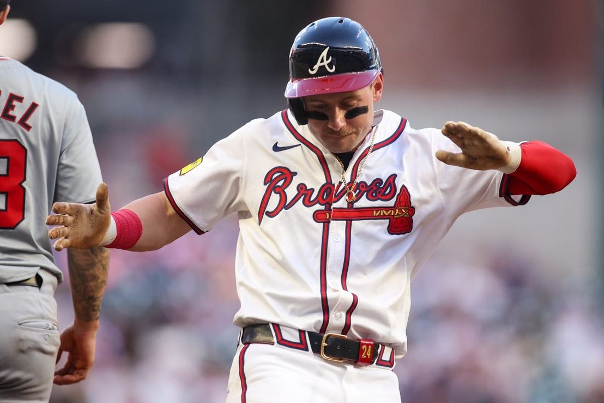May 30, 2024; Atlanta, Georgia, USA; Atlanta Braves left fielder Jarred Kelenic (24) reacts after a triple against the Washington Nationals in the third inning at Truist Park. Mandatory Credit: Brett Davis-USA TODAY Sports