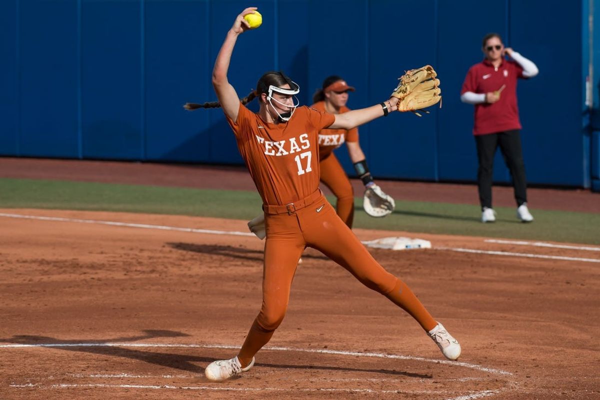 May 30, 2024; Oklahoma City, OK, USA; Texas Longhorns starting pitcher Teagan Kavan (17) pitches in the second inning against the Stanford Cardinals during a Women's College World Series softball game at Devon Park. Mandatory Credit: Brett Rojo-USA TODAY Sports