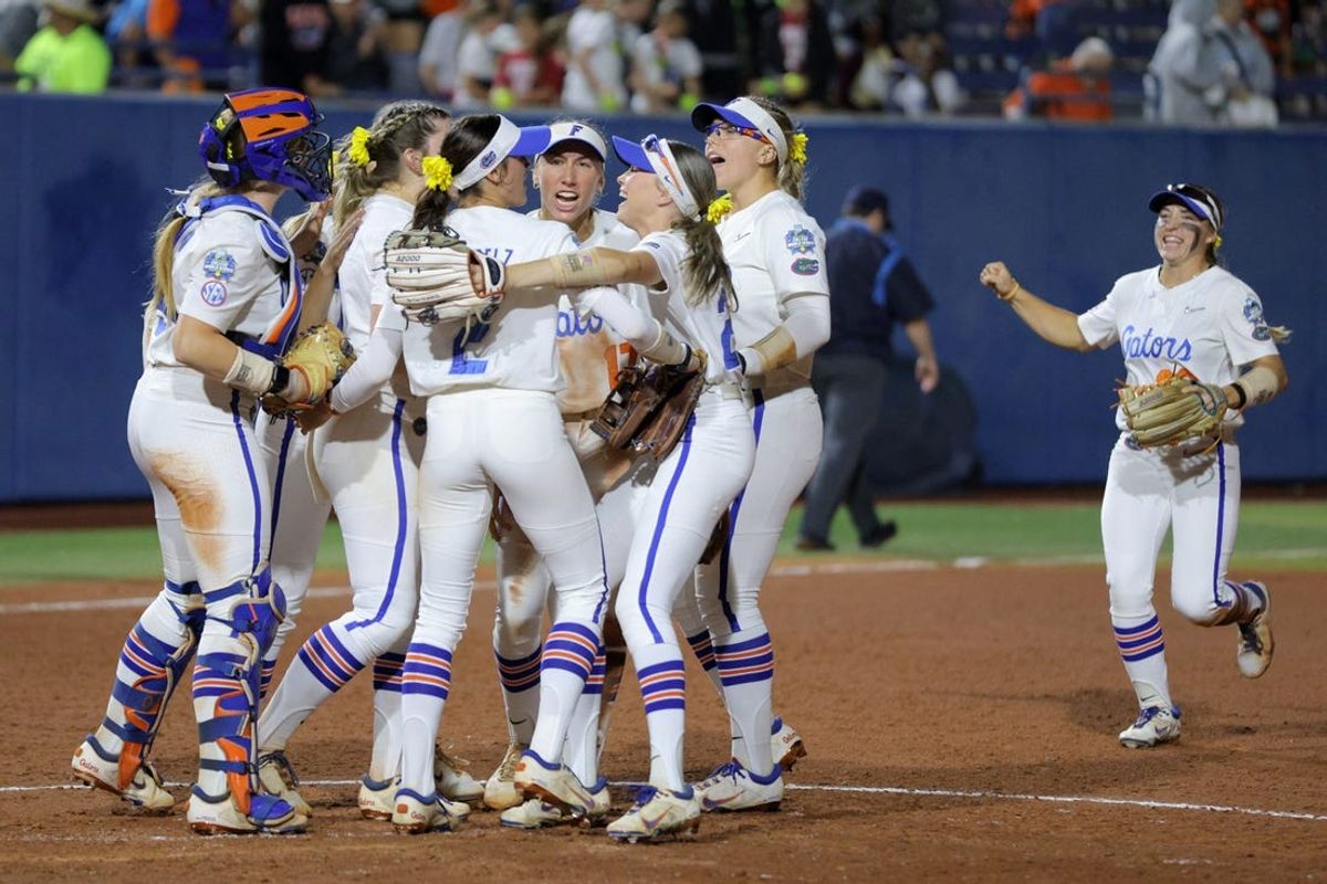 Florida celebrates after a Women's College World Series softball game between the Oklahoma State Cowgirls and the Florida Gators at Devon Park in Oklahoma City, Thursday, May 30, 2024. Florida won 1-0.