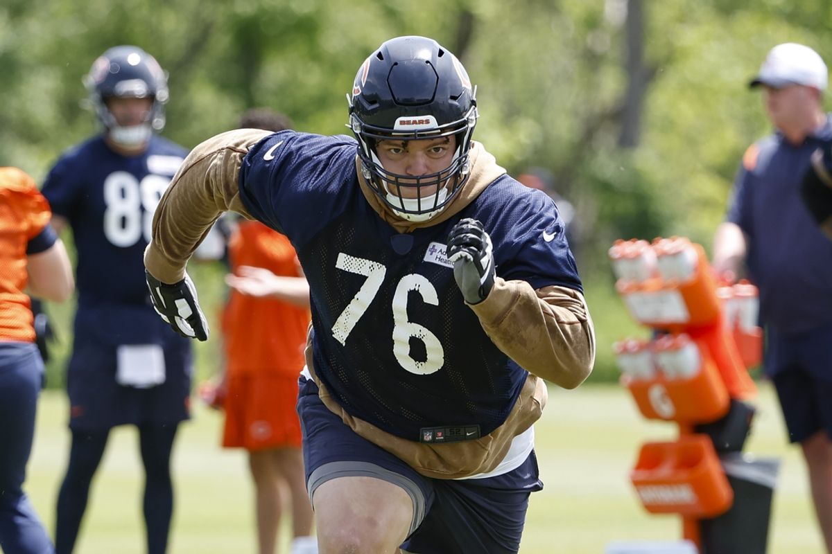 May 31, 2024; Lake Forest, IL, USA; Chicago Bears offensive guard Teven Jenkins (76) runs during organized team activities at Halas Hall. Mandatory Credit: Kamil Krzaczynski-Imagn Images