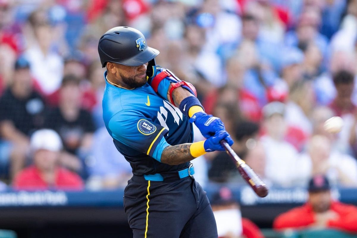 May 31, 2024; Philadelphia, Pennsylvania, USA; Philadelphia Phillies shortstop Edmundo Sosa (33) hits a two RBI home run against the St. Louis Cardinals during the second inning at Citizens Bank Park. Mandatory Credit: Bill Streicher-USA TODAY Sports