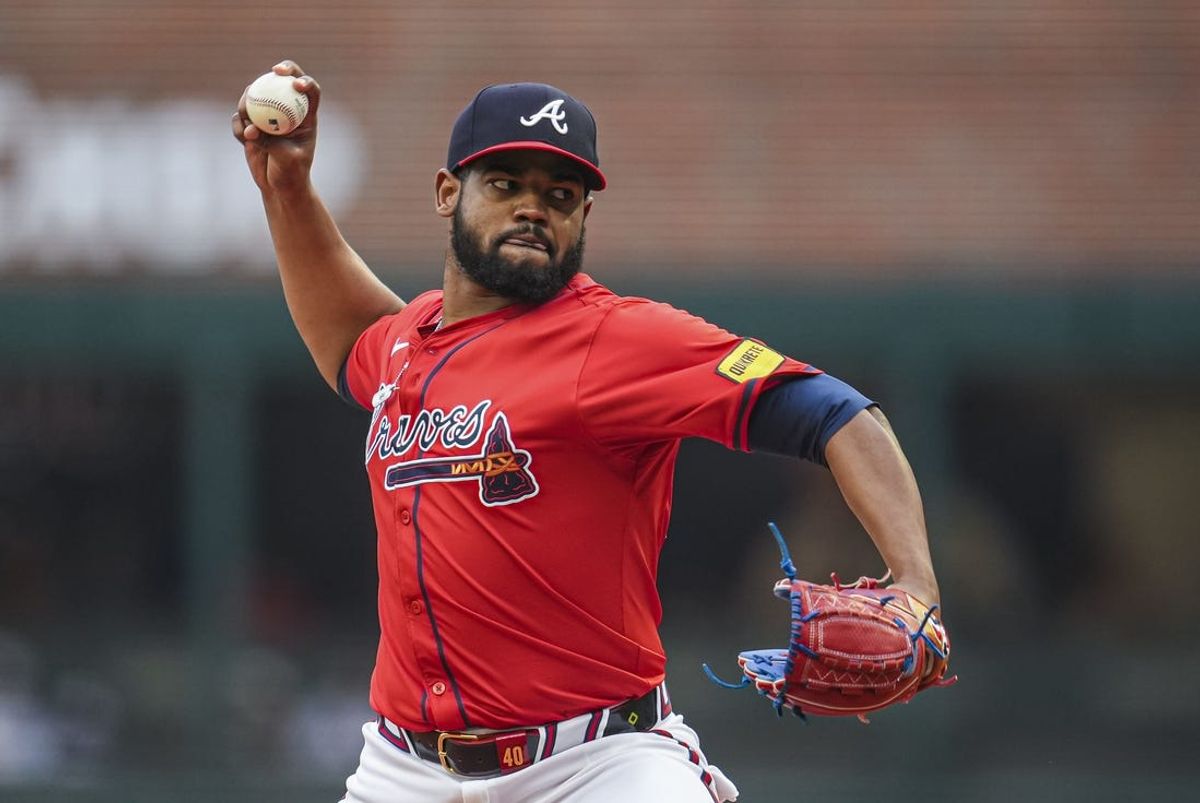 May 31, 2024; Cumberland, Georgia, USA; Atlanta Braves starting pitcher Reynaldo Lopez (40) pitches against the Oakland Athletics during the first inning at Truist Park. Mandatory Credit: Dale Zanine-USA TODAY Sports