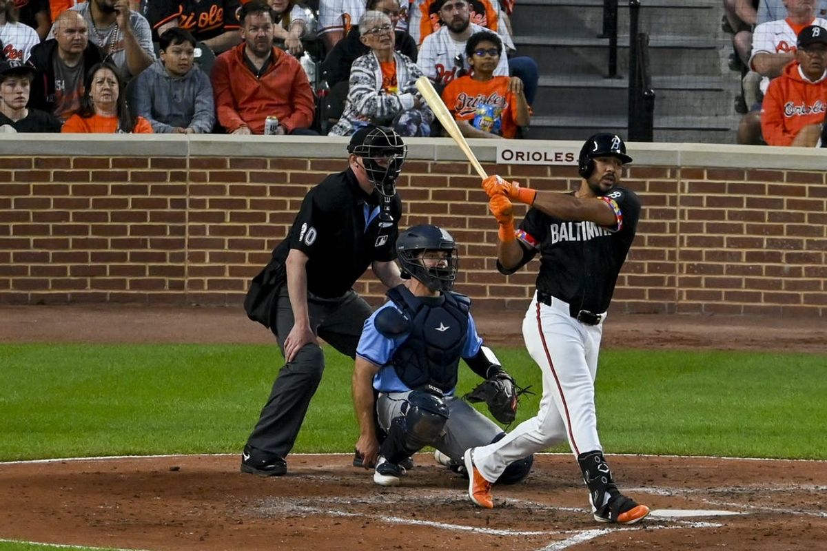 May 31, 2024; Baltimore, Maryland, USA;  Baltimore Orioles outfielder Anthony Santander (25) singles in the fourth inning against the Tampa Bay Rays at Oriole Park at Camden Yards. Mandatory Credit: Tommy Gilligan-USA TODAY Sports