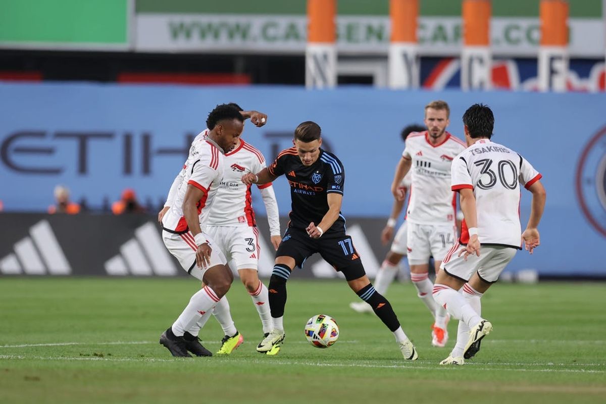 May 31, 2024; Bronx, New York, USA; New York City FC midfielder Hannes Wolf (17) plays the ball defended by San Jose Earthquakes forward Jeremy Ebobisse (11) in the first half at Yankee Stadium. Mandatory Credit: Brad Penner-USA TODAY Sports