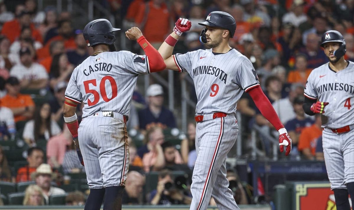 May 31, 2024; Houston, Texas, USA; Minnesota Twins designated hitter Trevor Larnach (9) celebrates with left fielder Willi Castro (50) after hitting a home run during the fifth inning against the Houston Astros at Minute Maid Park. Mandatory Credit: Troy Taormina-USA TODAY Sports