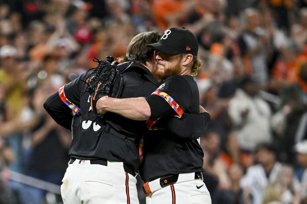 May 31, 2024; Baltimore, Maryland, USA; Baltimore Orioles pitcher Craig Kimbrel (46) hugs  catcher Adley Rutschman (35) after the game against the Tampa Bay Rays  at Oriole Park at Camden Yards. Mandatory Credit: Tommy Gilligan-USA TODAY Sports