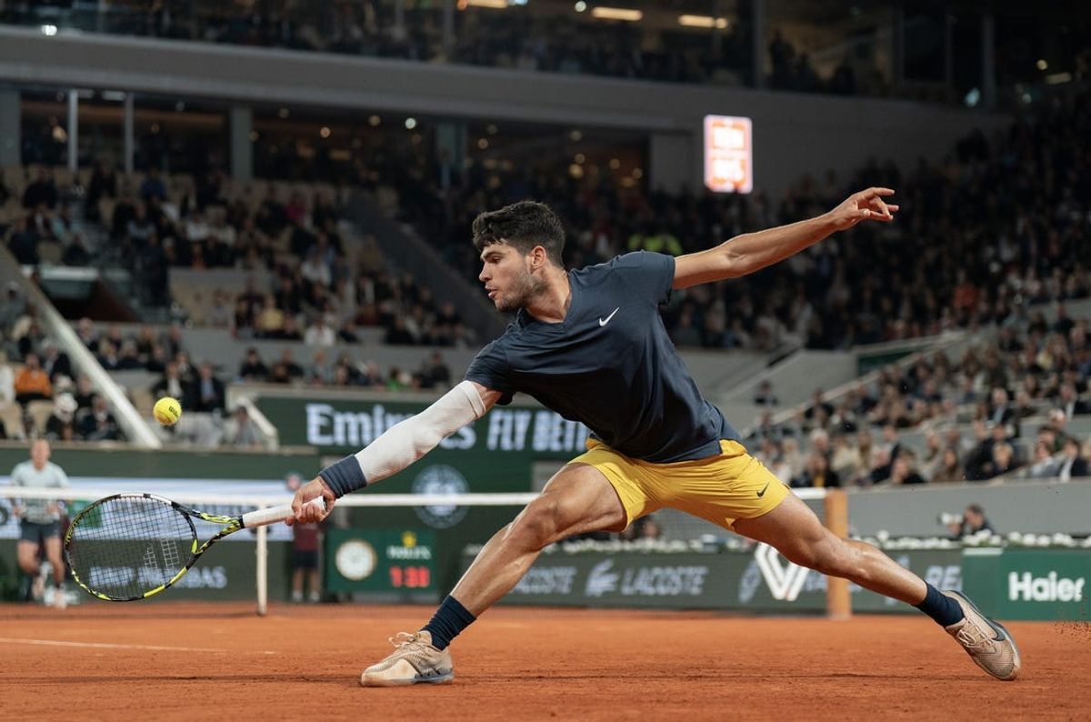 May 31, 2024; Paris, France; Carlos Alcaraz of Spain returns a shot during his match against Sebastian Korda of the United States on day six of Roland Garros at Stade Roland Garros. Mandatory Credit: Susan Mullane-USA TODAY Sports
