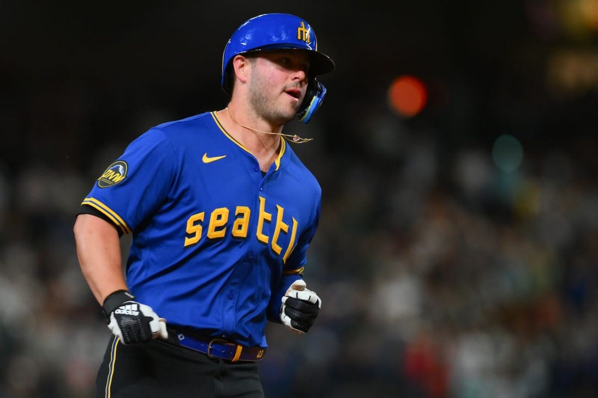 May 31, 2024; Seattle, Washington, USA; Seattle Mariners first baseman Ty France (23) jogs around the bases after hitting a home run against the Los Angeles Angels during the eighth inning at T-Mobile Park. Mandatory Credit: Steven Bisig-USA TODAY Sports