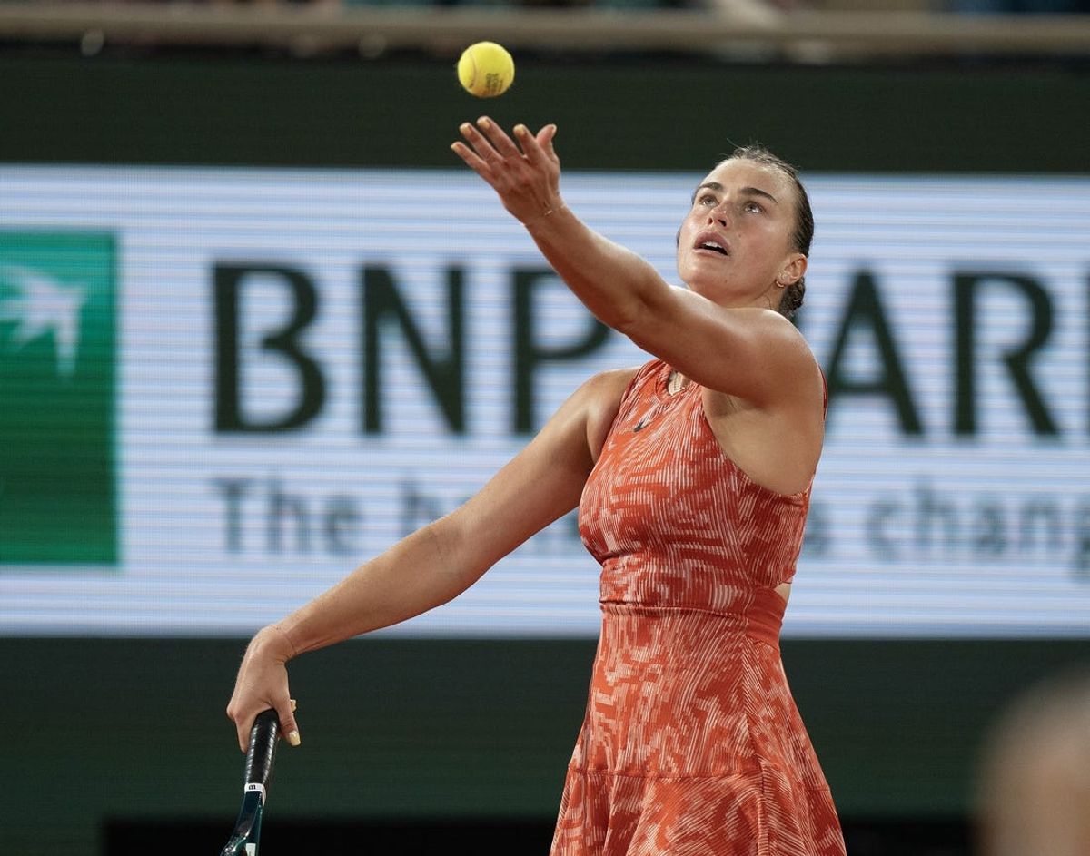 Jun 1, 2024; Paris, France; Aryna Sabalenka tosses the ball to serve during her match against Paula Badosa of Spain on day seven of Roland Garros at Stade Roland Garros. Mandatory Credit: Susan Mullane-USA TODAY Sports