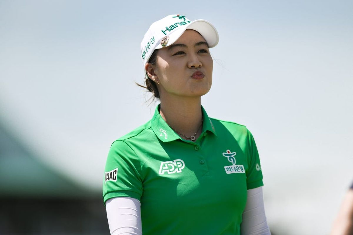 Jun 1, 2024; Lancaster, Pennsylvania, USA; Minjee Lee (AUS) walks the fairway on the first hole during the third round of the U.S. Women's Open golf tournament. Mandatory Credit: John Jones-USA TODAY Sports
