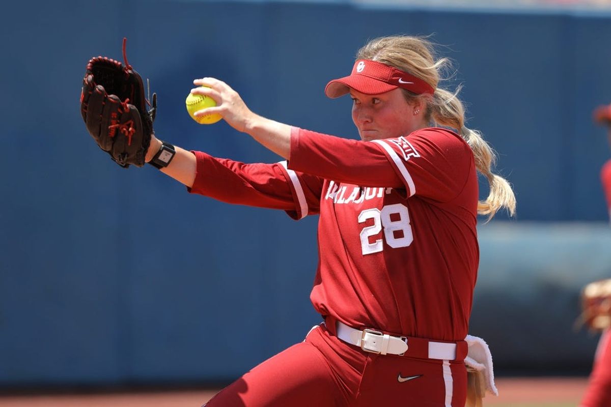 Oklahoma's Kelly Maxwell (28) pitches during a Women's College World Series softball game between the University of Oklahoma Sooners (OU) and the UCLA Bruins at Devon Park in Oklahoma City, Saturday, June 1, 2024.