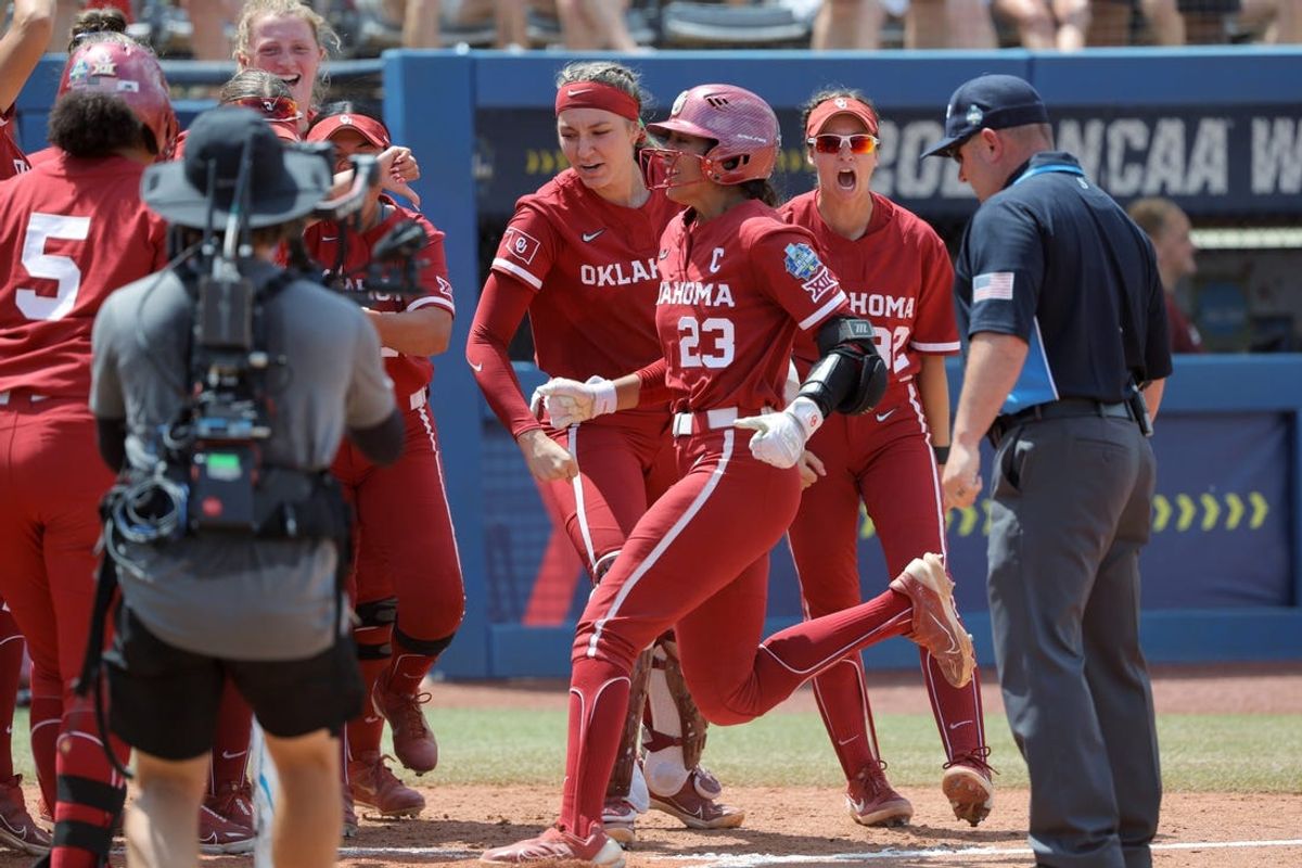 Oklahoma second baseman Tiare Jennings (23) celebrates after hitting a home run in the third inning of a Women's College World Series softball game between the University of Oklahoma Sooners (OU) and the UCLA Bruins at Devon Park in Oklahoma City, Saturday, June 1, 2024.