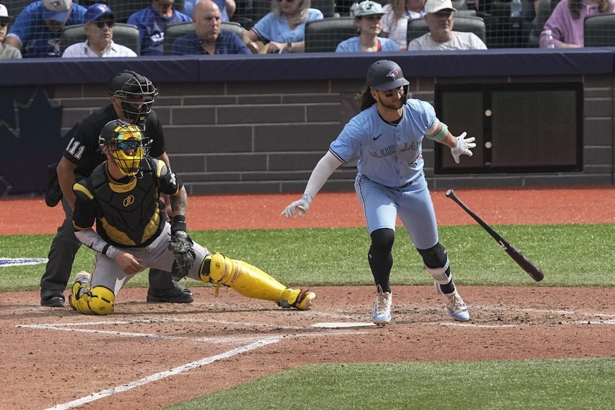 Jun 1, 2024; Toronto, Ontario, CAN; Toronto Blue Jays shortstop Bo Bichette (11) lines out to Pittsburgh Pirates starting pitcher Mitch Keller (not pictured) during the sixth inning at Rogers Centre. Mandatory Credit: John E. Sokolowski-USA TODAY Sports