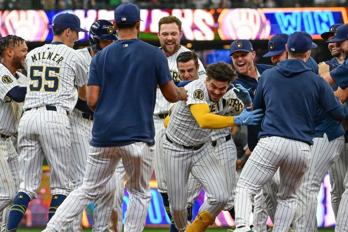 Jun 1, 2024; Milwaukee, Wisconsin, USA; Milwaukee Brewers shortstop Willy Adames (27) celebrates after driving in the winning run in the tenth inning against the Chicago White Sox at American Family Field. Mandatory Credit: Benny Sieu-USA TODAY Sports