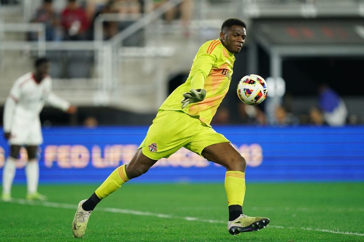 Jun 1, 2024; Washington, District of Columbia, USA; Toronto FC goalkeeper Sean Johnson (1) plays the ball in the second half against D.C. United at Audi Field. Mandatory Credit: Amber Searls-USA TODAY Sports