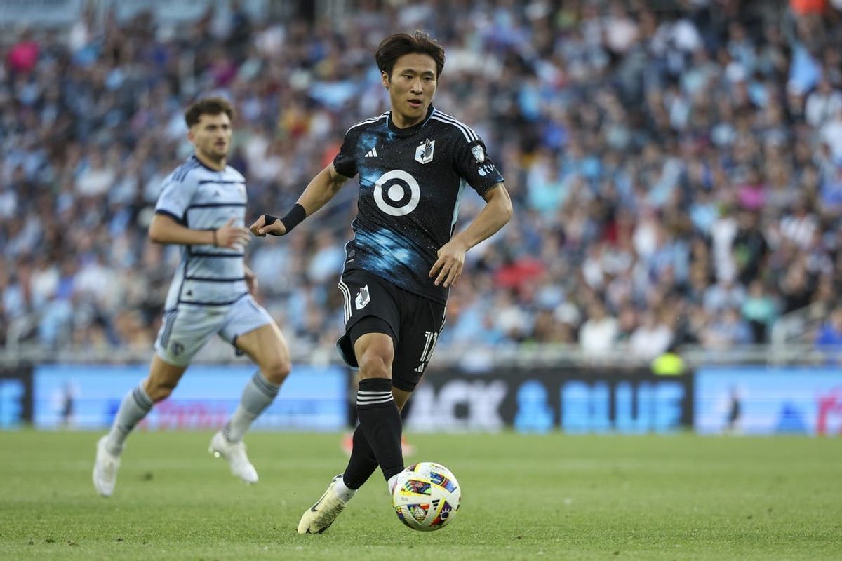 Jun 1, 2024; Saint Paul, Minnesota, USA; Minnesota United forward Sang Bin Jeong (11) controls the ball during the first half against Sporting Kansas City at Allianz Field. Mandatory Credit: Matt Krohn-USA TODAY Sports