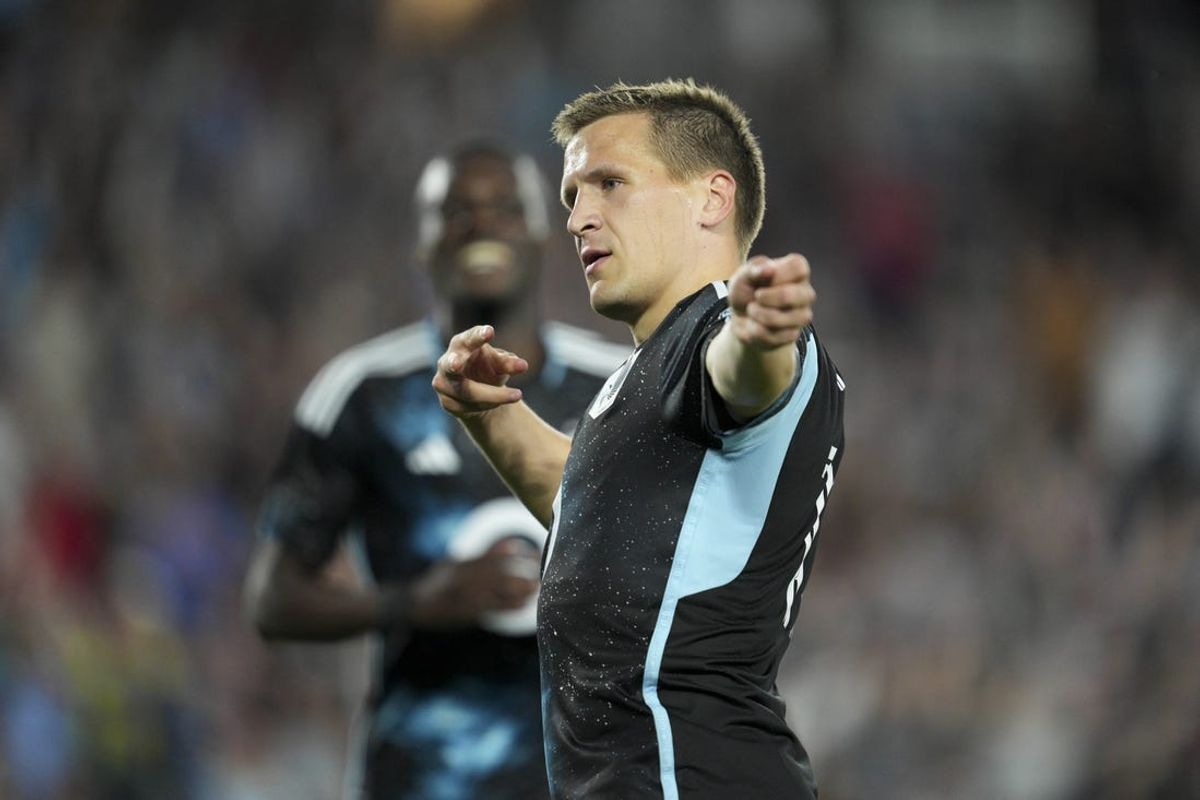 Jun 1, 2024; Saint Paul, Minnesota, USA; Minnesota United midfielder Robin Lod (17) celebrates after scoring a goal during the second half against Sporting Kansas City at Allianz Field. Mandatory Credit: Matt Blewett-USA TODAY Sports