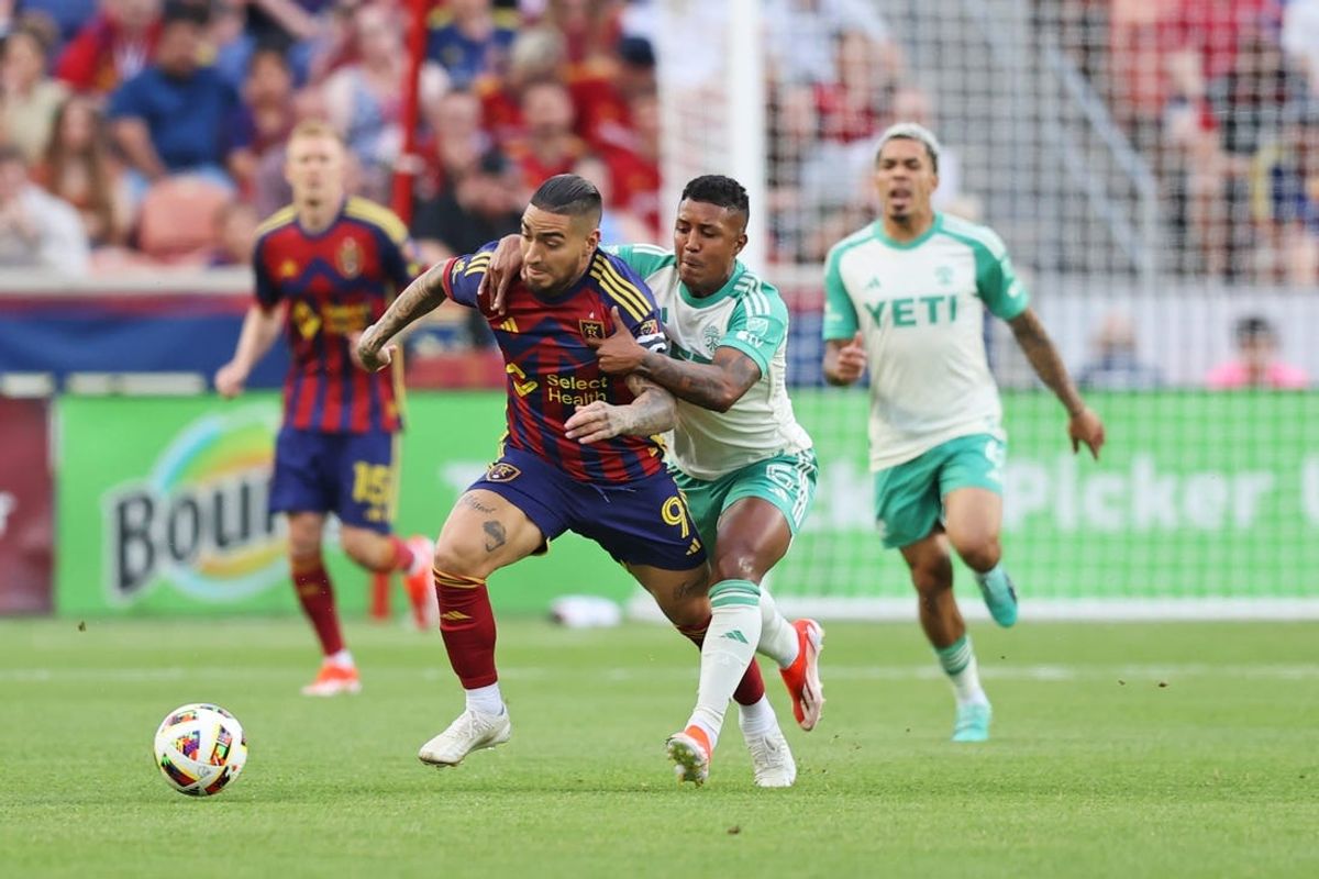 Jun 1, 2024; Sandy, Utah, USA; Real Salt Lake forward Cristian Arango (9) and Austin FC midfielder Jhojan Valencia (5) battle for the ball during the first half at America First Field. Mandatory Credit: Rob Gray-USA TODAY Sports