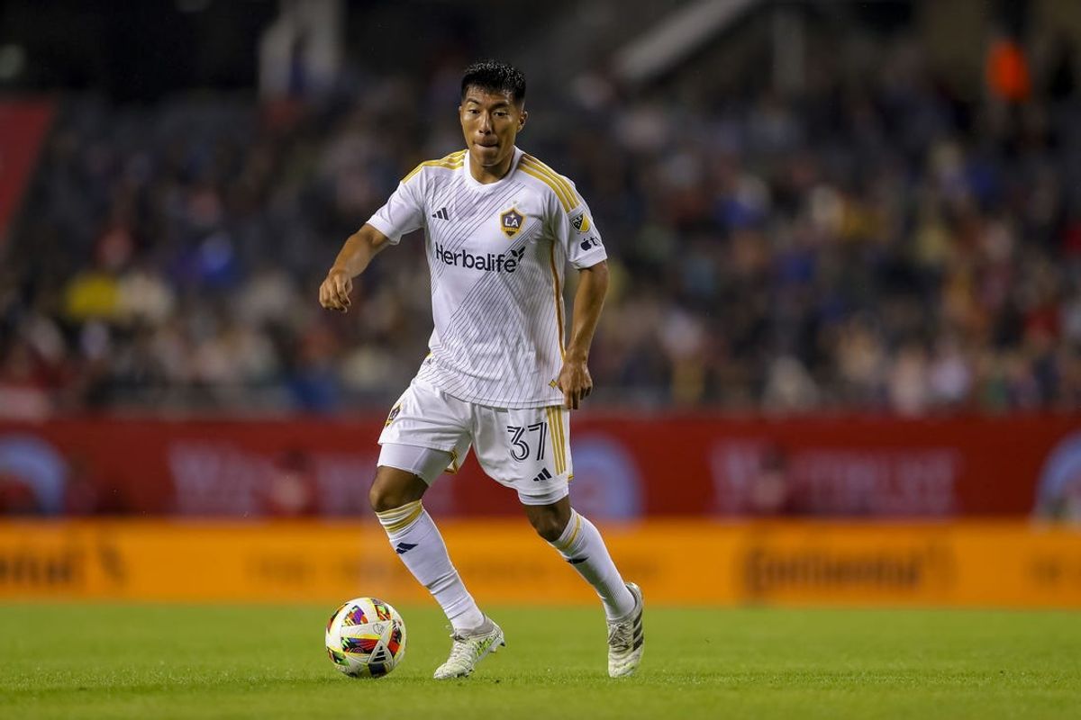 Jun 1, 2024; Chicago, Illinois, USA; LA Galaxy midfielder Daniel Aguirre (37) dribbles the ball during the second half at Soldier Field. Mandatory Credit: Melissa Tamez-USA TODAY Sports