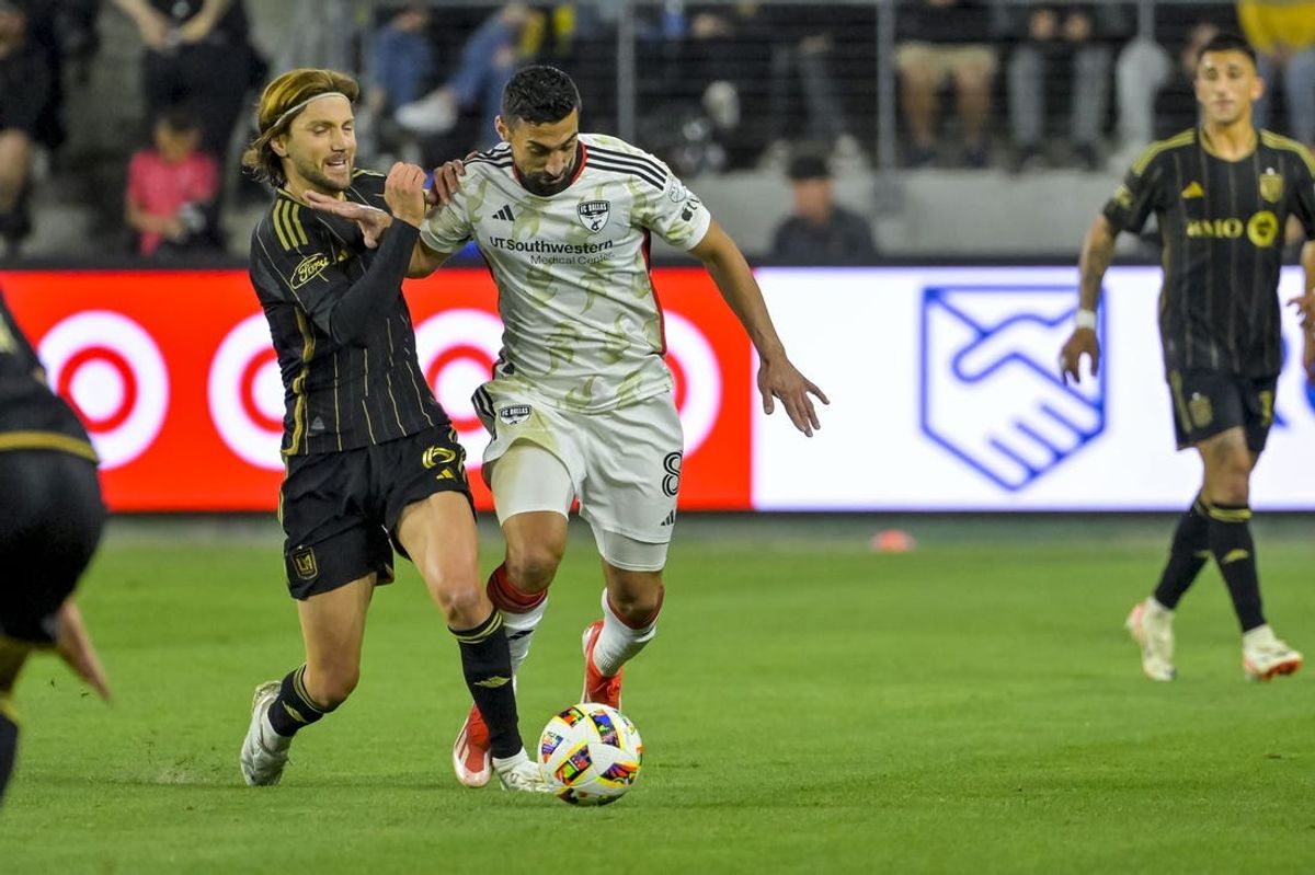 Jun 1, 2024; Los Angeles, California, USA; LAFC midfielder Ilie Sanchez (6) and FC Dallas midfielder Sebastian Lletget (8) battle for the ball during the second half at BMO Stadium. Mandatory Credit: Jayne Kamin-Oncea-USA TODAY Sports