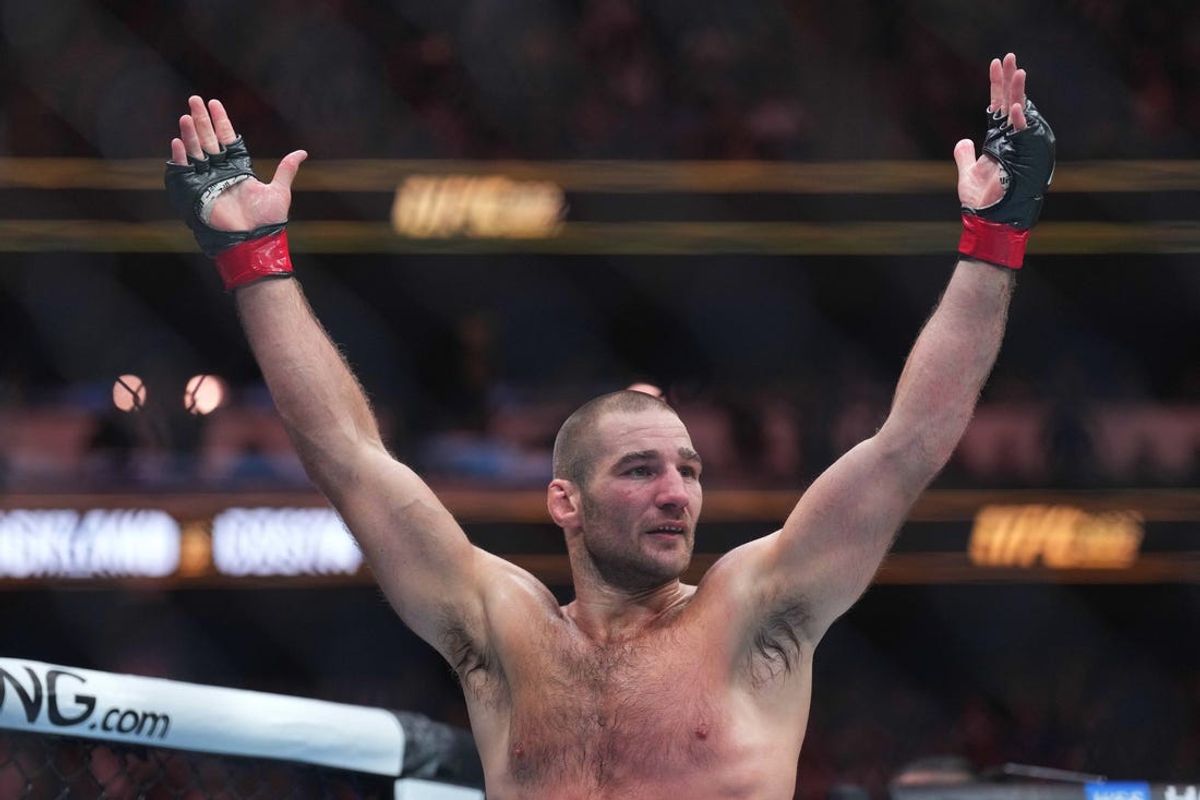 Jun 1, 2024; Newark, New Jersey, USA; Sean Strickland (red gloves)celebrates defeating Paulo Costa (blue gloves) during UFC 302 at Prudential Center. Mandatory Credit: Joe Camporeale-USA TODAY Sports