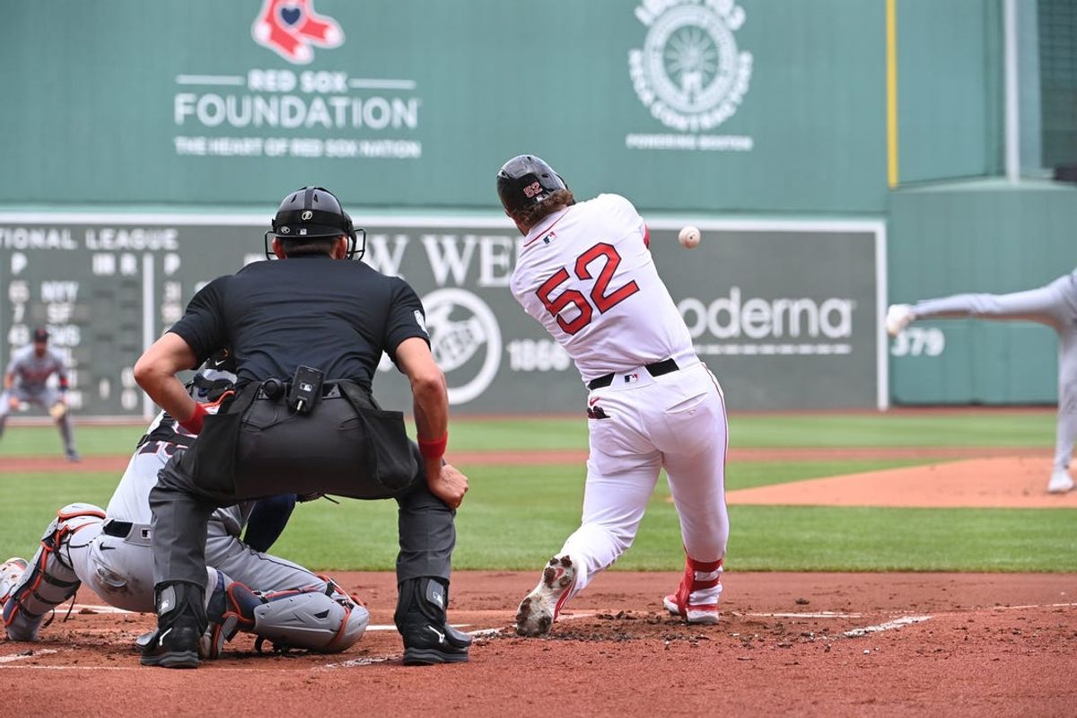 Jun 2, 2024; Boston, Massachusetts, USA;  Boston Red Sox right fielder Wilyer Abreu (52) hits a double against the Detroit Tigers during the first inning at Fenway Park. Mandatory Credit: Eric Canha-USA TODAY Sports