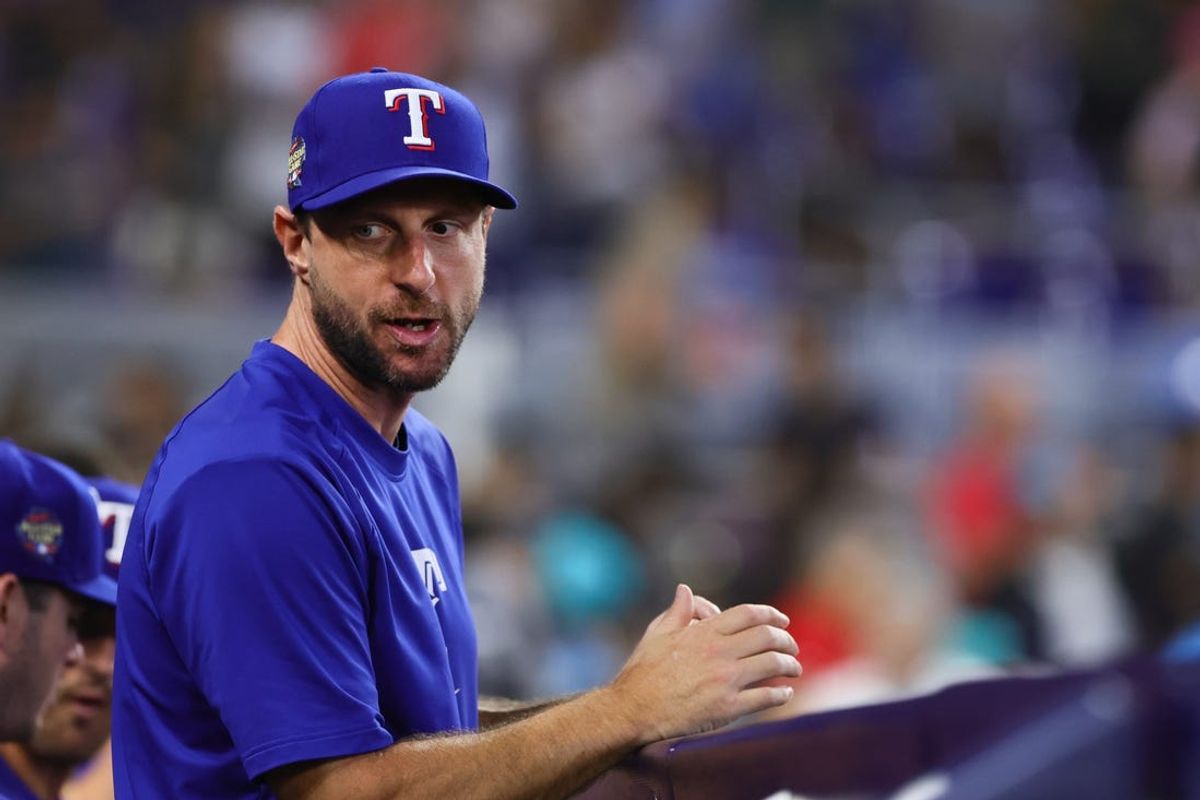 Jun 2, 2024; Miami, Florida, USA; Texas Rangers starting pitcher Max Scherzer (31) looks on from inside the dugout against the Miami Marlins at loanDepot Park. Mandatory Credit: Sam Navarro-USA TODAY Sports