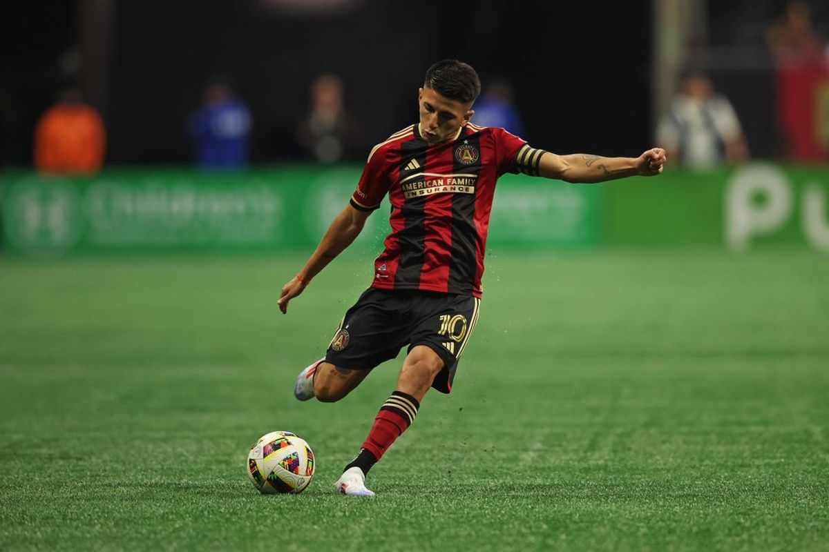 Jun 2, 2024; Atlanta, Georgia, USA; Atlanta United midfielder Thiago Almada (10) controls the ball during the first half against Charlotte FC at Mercedes-Benz Stadium. Mandatory Credit: Brett Davis-USA TODAY Sports