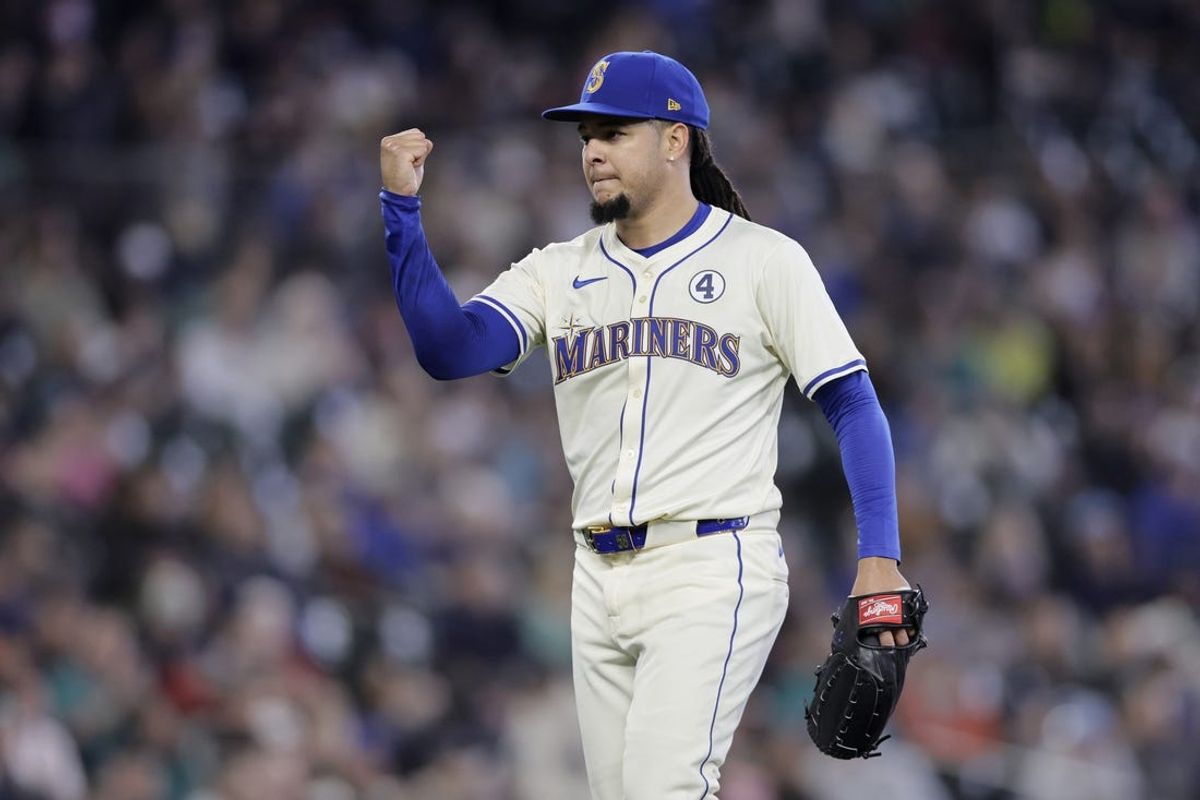 Jun 2, 2024; Seattle, Washington, USA; Seattle Mariners starting pitcher Luis Castillo (58) pumps his fist after the Los Angeles Angels final out of the seventh inning at T-Mobile Park. Mandatory Credit: John Froschauer-USA TODAY Sports