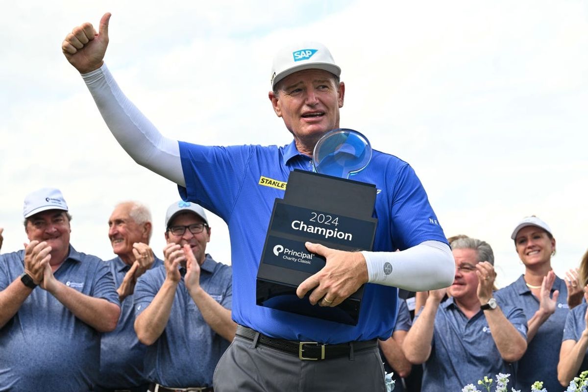 Jun 2, 2024; Des Moines, Iowa, USA; Ernie Els celebrates with the winner's trophy after the final round of the Principal Charity Classic at Wakonda Club in Des Moines, Iowa.  Mandatory Credit: Jeffrey Becker-USA TODAY Sports