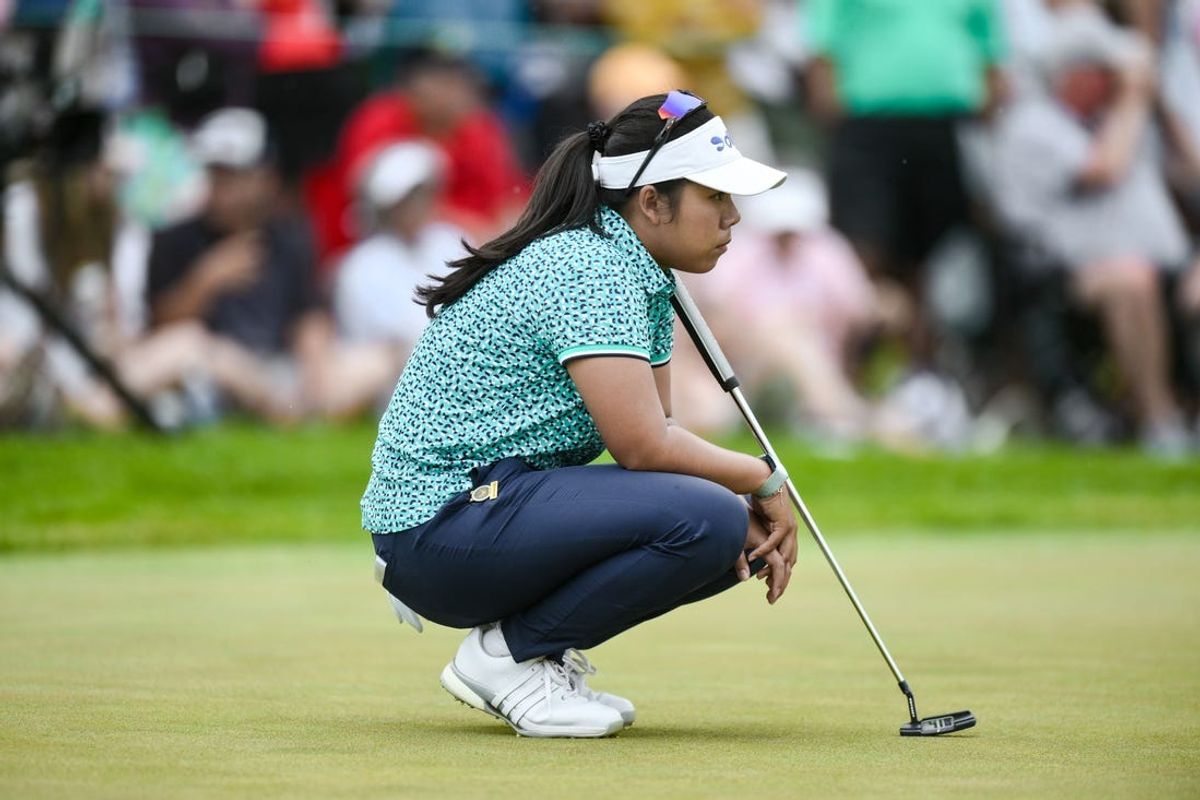 Jun 2, 2024; Lancaster, Pennsylvania, USA; Arpichaya Yubol (THA) lines up a putt on the 18th green during the final round of the U.S. Women's Open golf tournament. Mandatory Credit: John Jones-USA TODAY Sports