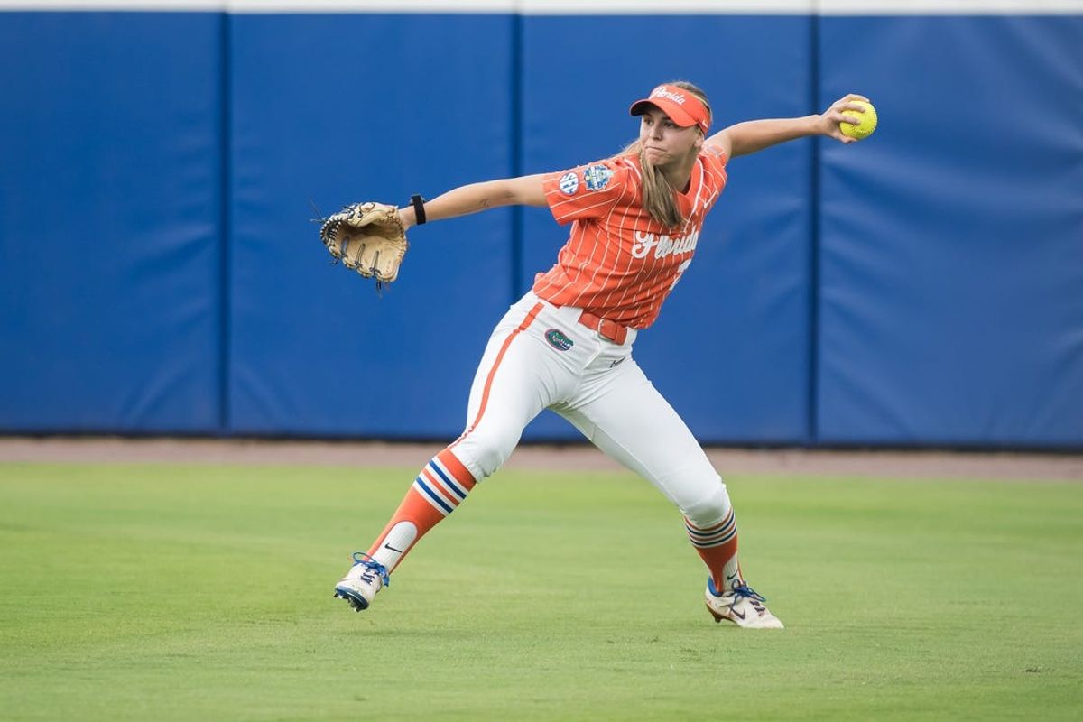 Jun 2, 2024; Oklahoma City, OK, USA;  Florida Gators outfielder Katie Kistler (29) throws the ball in in the second inning against the Alabama Crimson Tide during a Women's College World Series softball losers bracket elimination game at Devon Park. Mandatory Credit: Brett Rojo-USA TODAY Sports