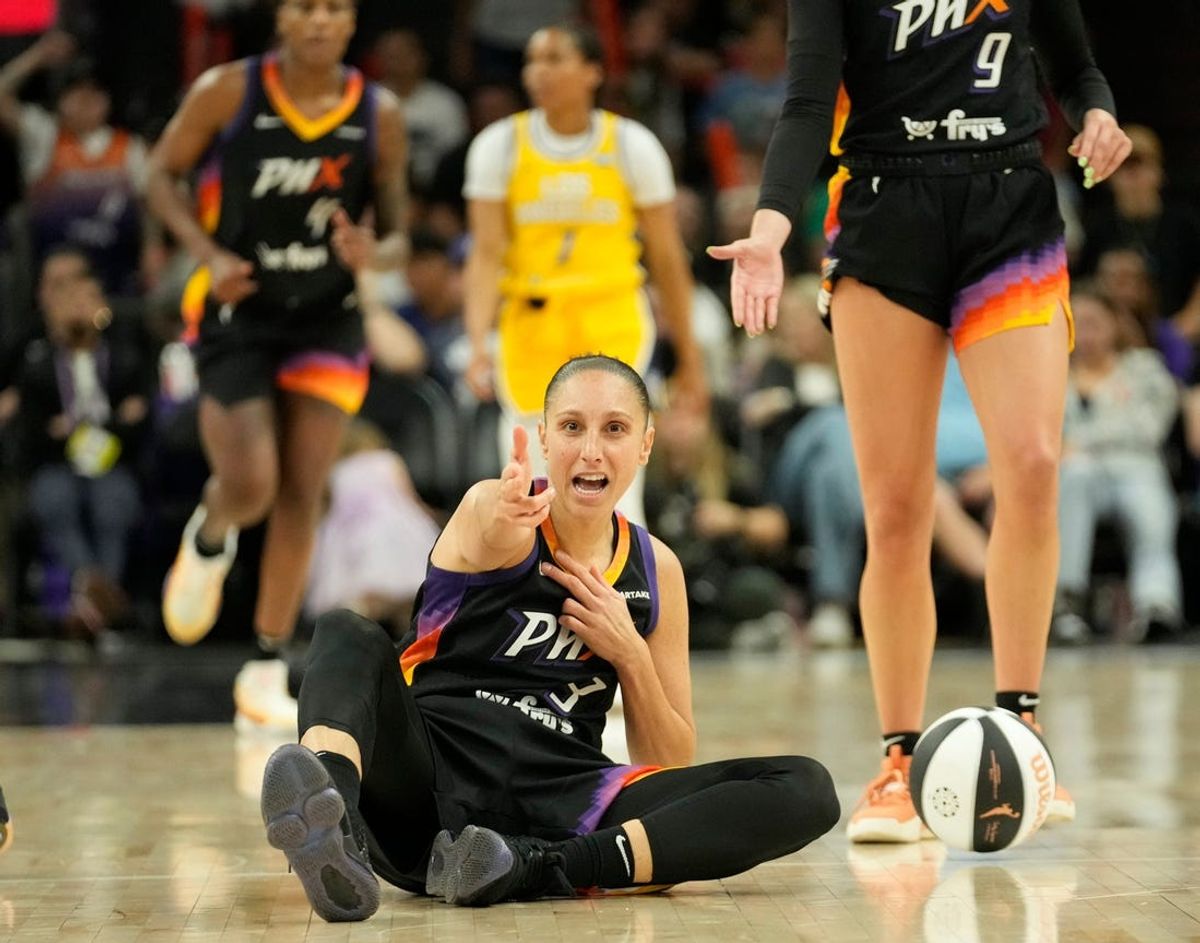 Phoenix Mercury guard Diana Taurasi (3) points after being fouled against the Los Angeles Sparks during the fourth quarter on Sunday, June 2, 2024, at Footprint Center in Phoenix.