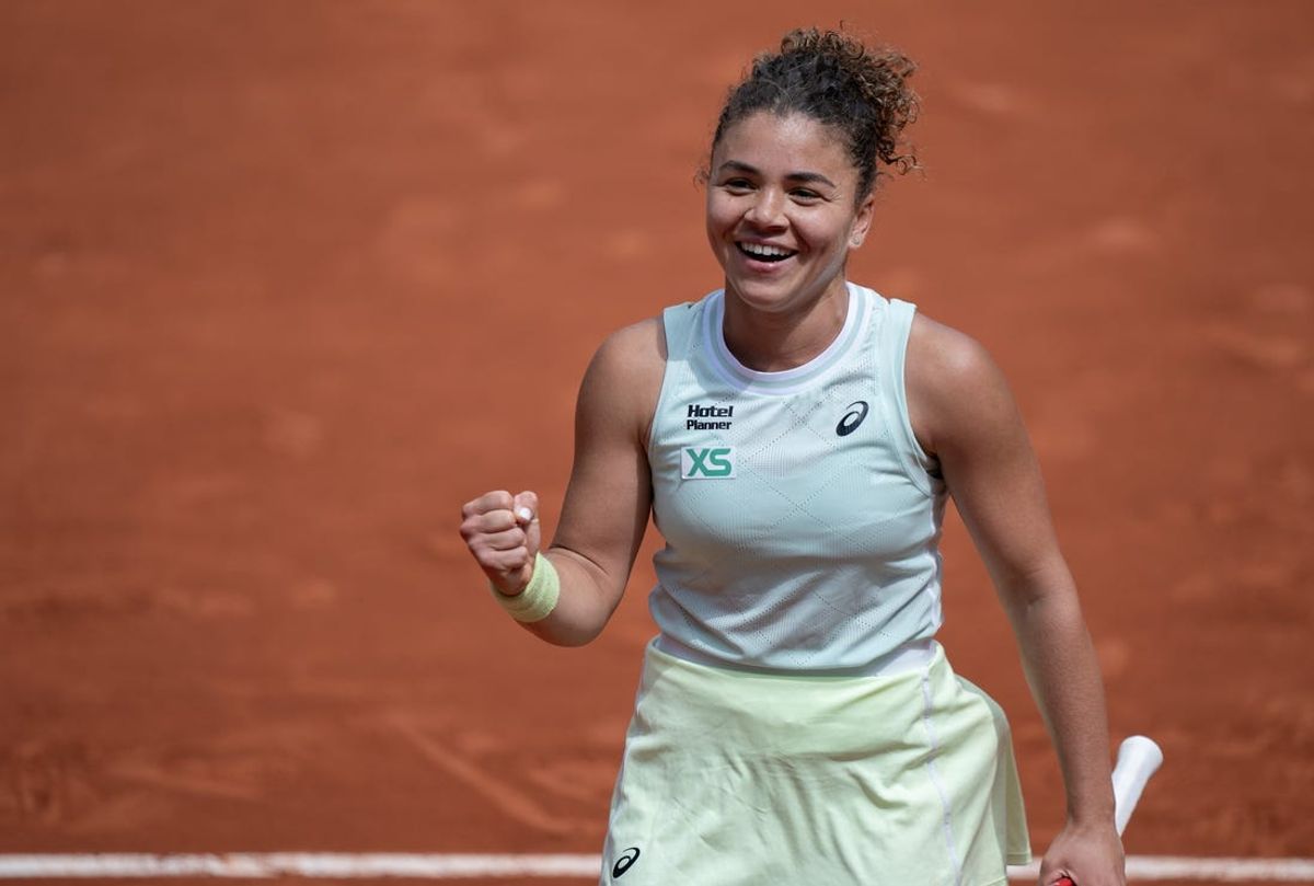Jun 3, 2024; Paris, France; Jasmine Paolini of Italy celebrates winning her match against Elina Avanesyan on day nine of Roland Garros at Stade Roland Garros. Mandatory Credit: Susan Mullane-USA TODAY Sports