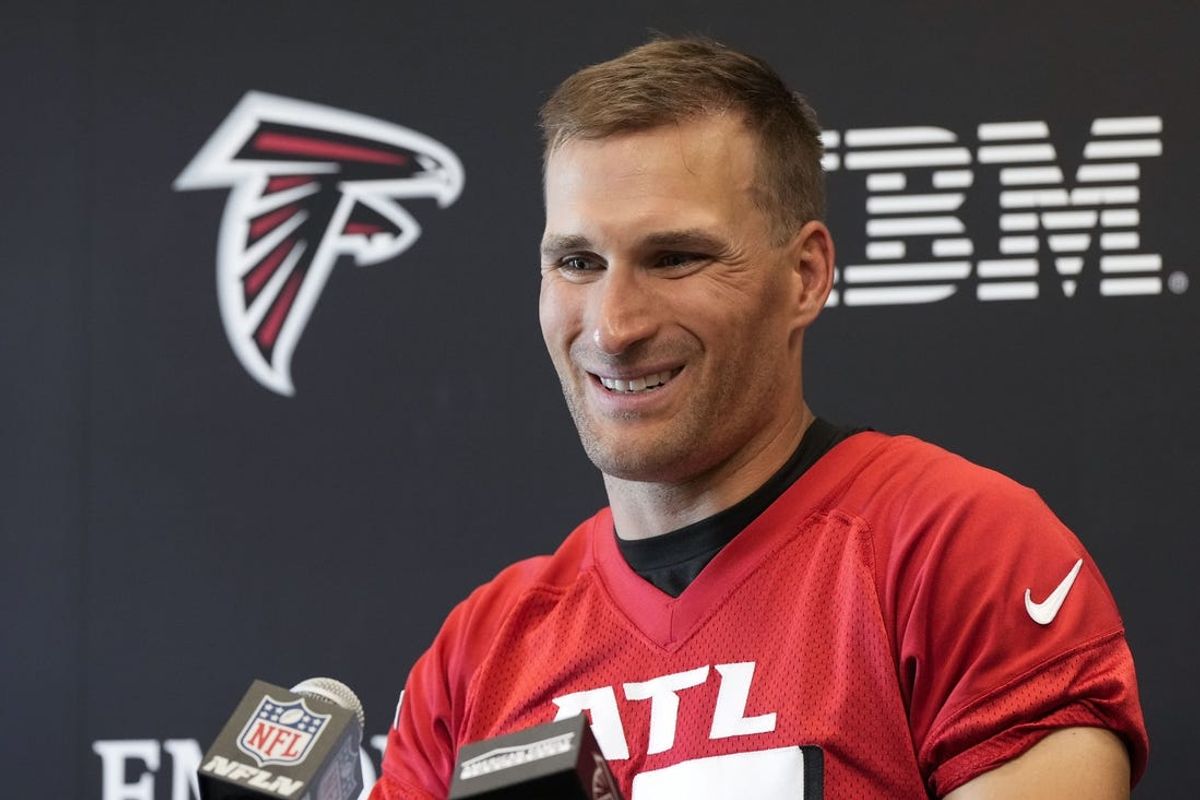 Jun 3, 2024; Atlanta, GA, USA; Atlanta Falcons quarterback Kirk Cousins (18) is interviewed after Falcons OTA at the Falcons Training facility. Mandatory Credit: Dale Zanine-USA TODAY Sports