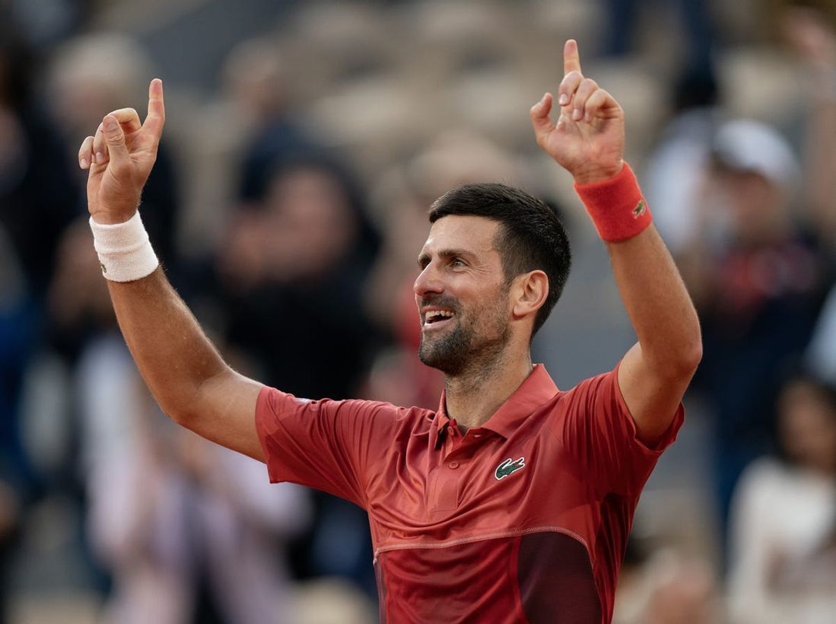 Jun 3, 2024; Paris, France; Novak Djokovic of Serbia celebrates winning his match against Francisco Cerundolo of Argentina on day nine of Roland Garros at Stade Roland Garros. Mandatory Credit: Susan Mullane-USA TODAY Sports