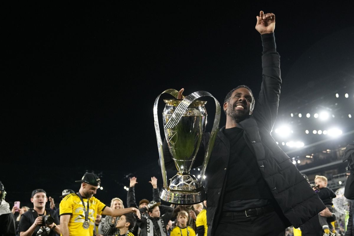 Dec 9, 2023; Columbus, OH, USA; Columbus Crew head coach Wilfried Nancy hoists the Philip J. Anschutz Trophy after defeating the Los Angeles FC in the 2023 MLS Cup championship game at Lower.com Field. Mandatory Credit: Adam Cairns-The Columbus Dispatch