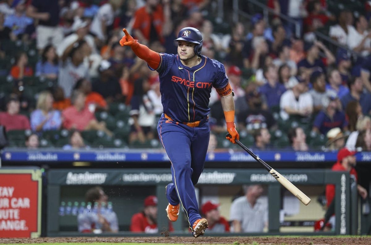 Jun 3, 2024; Houston, Texas, USA; Houston Astros catcher Yainer Diaz (21) celebrates after hitting a home run during the eighth inning against the St. Louis Cardinals at Minute Maid Park. Mandatory Credit: Troy Taormina-USA TODAY Sports