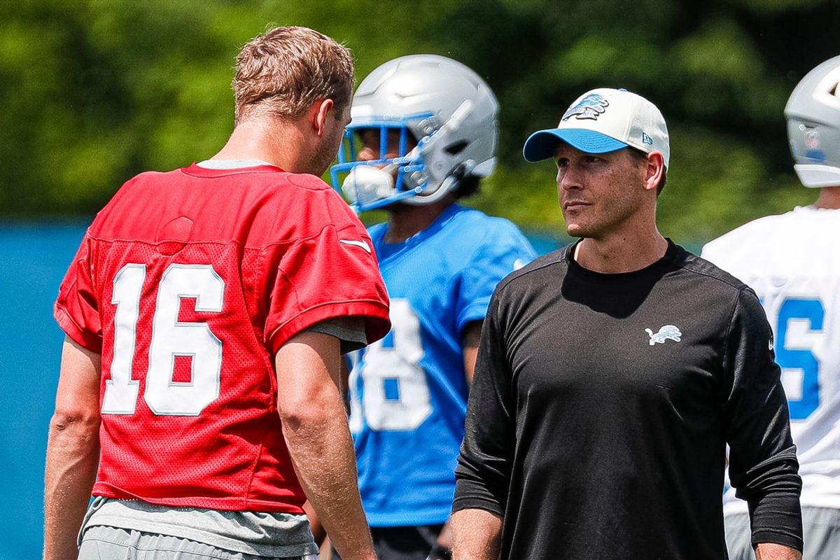 Detroit Lions quarterback Jared Goff (16) talks to offensive coordinator Ben Johnson at practice during mini camp at Detroit Lions headquarters and practice facility in Allen Park on Tuesday, June 4, 2024.