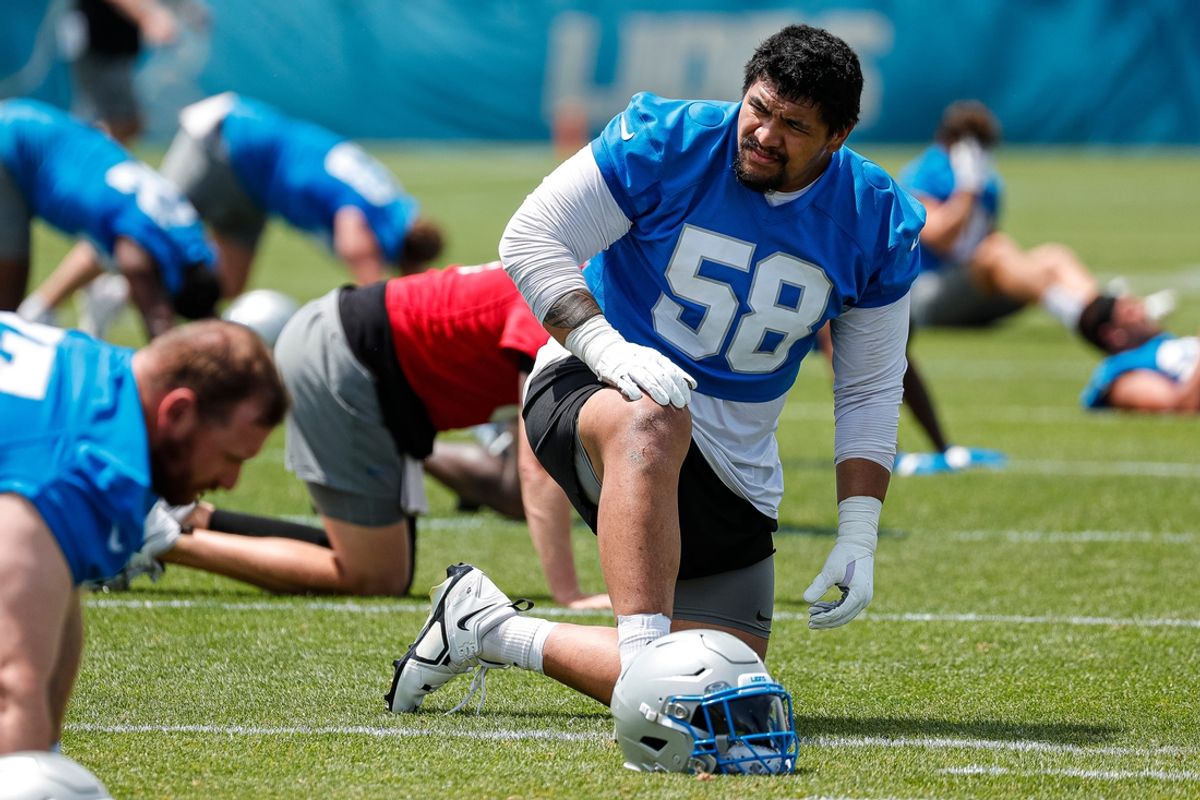 Detroit Lions offensive tackle Penei Sewell (58) practices during mini camp at Detroit Lions headquarters and practice facility in Allen Park on Tuesday, June 4, 2024.