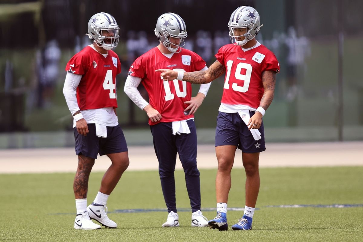 Jun 4, 2024; Frisco, TX, USA;  Dallas Cowboys quarterback Dak Prescott (4) and quarterback Cooper Rush (10) and quarterback Trey Lance (19) talk during practice at the Ford Center at the Star Training Facility in Frisco, Texas. Mandatory Credit: Tim Heitman-USA TODAY Sports